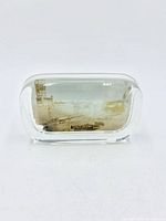 Front view showing sepia photo inside glass paperweight