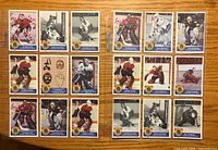 Fronts of 18 Captain High Liner Greatest Goalies cards arranged on tabletop