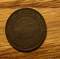 Reverse side showing ONE CENT CANADA 1918 within decorative wreath