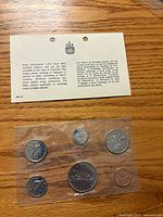 Front view of sealed 1968 coin set with information card