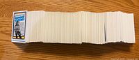 Side view of full stack of hockey cards showing quantity and uniform card backs