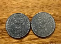 Reverse view showing British Columbia coat of arms and 1971 date on both coins