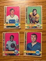 Fronts of four 1972-73 O-Pee-Chee hockey cards; two referenced in lot