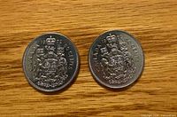Obverse view showing Canadian Coat of Arms and 1972 date on both coins