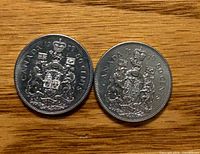 Obverse sides of two 1979 Canadian 50-cent coins