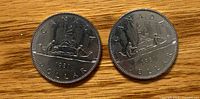 Both coins reverse side showing voyageur design and 1981 date