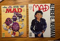 Front covers of both MAD magazine issues