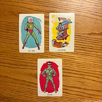 Fronts of three Batman playing cards showing Mr. Zero, Batcopter, Riddler
