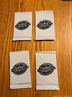 Front view of four sealed 2008 Upper Deck Hobby Review packs