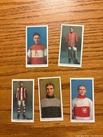 Fronts of five C56 reprint hockey cards
