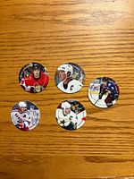Front view of all five pogs showing player photos