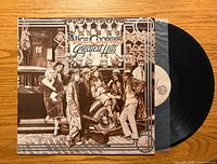 Front cover and vinyl disc of Alice Cooper Greatest Hits