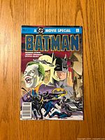 Front cover of Batman Movie Special comic showing Batman, Joker and Gotham imagery