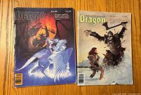 Front covers of Dragon Magazine issues 115 and 126