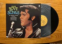 Front sleeve showing title, artist, and vinyl partially out of jacket