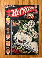 Front cover displaying title, cars, character portraits, price and issue info