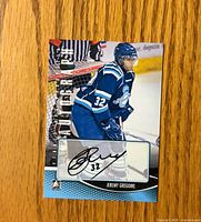 Front of Jeremy Gregoire autographed hockey card with signature and player image