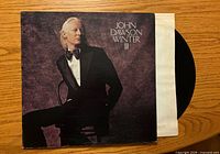 Front cover of John Dawson Winter III LP with record partially visible in inner sleeve
