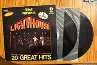 Front of sleeve with both vinyl discs partially visible