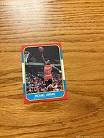 Front of Michael Jordan rookie reprint card showing Fleer-style design