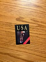 Front of Michael Jordan USA Olympic trading card showing design and image