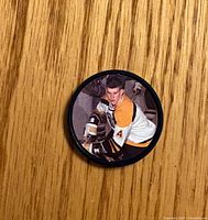 Front of coin with Bobby Orr image