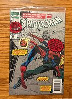 Front of sealed Spider-Man #46 comic showing cover art and polybag