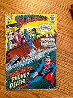 Front cover of Superman #210 showing title, price, date and main artwork