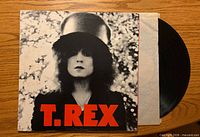 Front cover of T. Rex album with record partially visible