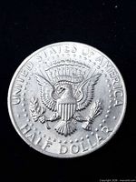 Reverse of 1972 Kennedy half dollar showing presidential seal