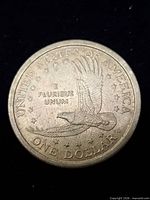 Reverse of 2000 P Sacagawea dollar showing eagle and denomination