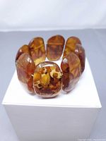 full view of bracelet resting on included white gift box