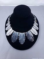 Full view of necklace on display bust