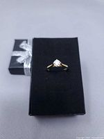 Ring presented on black box showing overall appearance