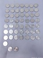 All 52 quarters arranged in grid obverse up