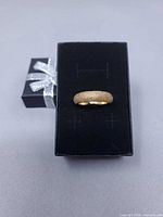 Ring on top of black box showing overall look