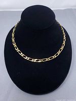 Entire necklace displayed on bust form