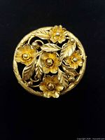 Front view showing overall circular floral design