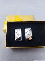 Pair of cufflinks in gift box, top view