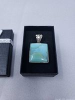 Front view: square pendant in gift box
