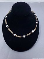 Full view of necklace on display bust