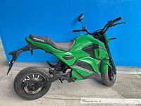 Full left side view of green Armada electric bike