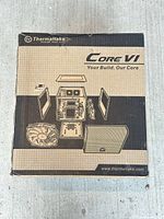 Sealed retail box showing Thermaltake Core VI branding and exploded diagram of chassis