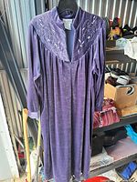 Front view of purple velour Vanity Fair nightgown hanging