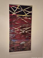 Full view of vertical abstract canvas with geometric lines and vehicle imagery