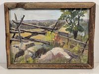 Front view of framed landscape painting