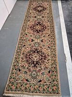 Full view of Persian wool runner showing entire length and pattern