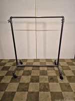 Full view of pipe clothing rack showing width and height