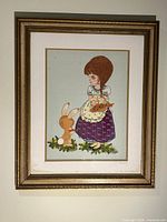 Full view of framed embroidered artwork