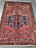 Full view of Persian Malayer rug showing overall pattern and fringe